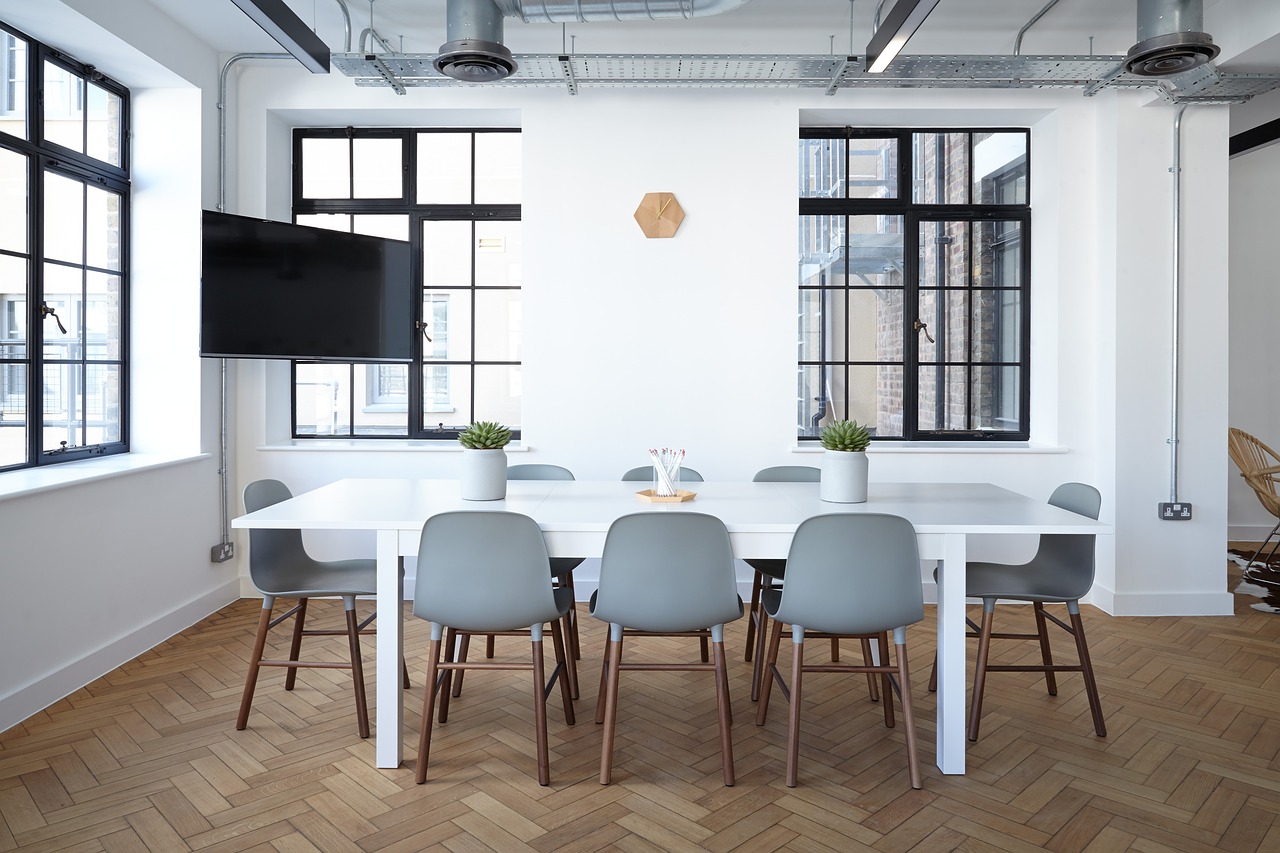 Modern office space remodel in Richmond, Virginia featuring contemporary design with herringbone flooring and industrial elements
